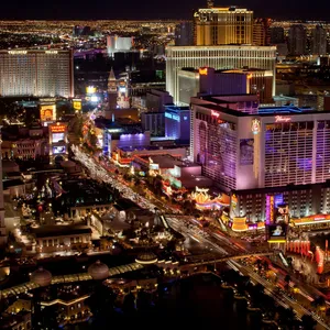 Enjoy The Vibrant Nightlife Of Las Vegas From The Comfort Of Your Phone. Wallpaper