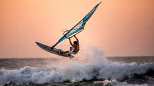 Enjoy Thrilling Beach Water Sports Adventure Wallpaper