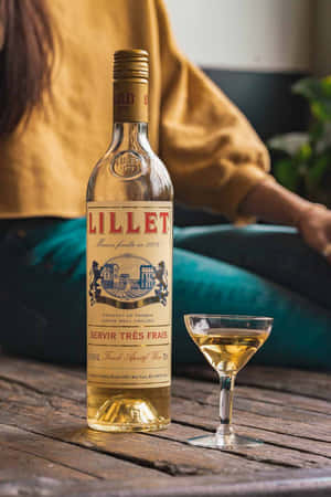 Enjoying A Bottle Of White Wine Wallpaper