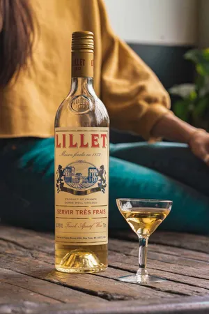 Enjoying A Bottle Of White Wine Wallpaper