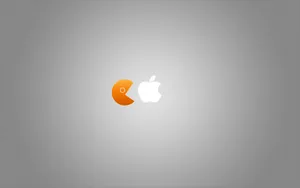 Enjoying A Classic Arcade Game Wallpaper