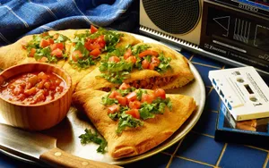 Enjoying A Delicious Home-cooked Meal Wallpaper