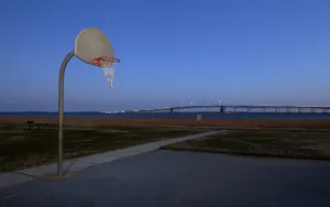 Enjoying A Scenic Game Of Basketball Wallpaper