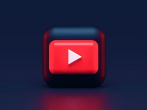 Enjoying Content On A Video Streaming Platform Wallpaper