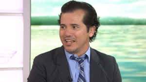 Enjoying The Scene With John Leguizamo Wallpaper