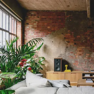 Entertainment Room With Exposed Wall Wallpaper