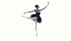 Enthralling Black And White Image Of Ballerina In Arabesque Pose Wallpaper