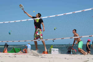 Enthralling Game Of Beach Tennis Wallpaper