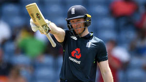 Eoin Morgan Raising Cricket Bat Wallpaper