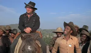 Equestrian Rider On A Horse In The Scenic Countryside Wallpaper