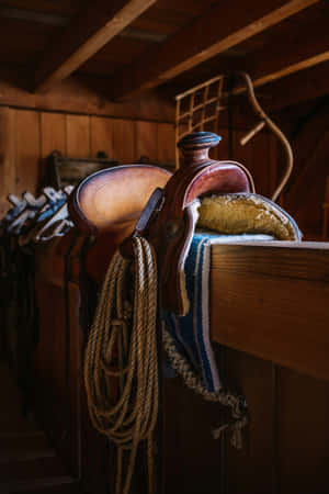 Equestrian Saddleand Ropein Stable Wallpaper