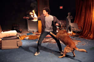 Eric Andre Flaming Arm Dog Attack Wallpaper