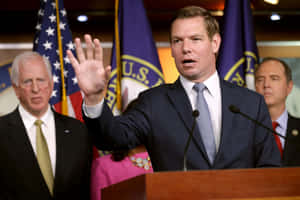 Eric Swalwell Speakingat Podium Wallpaper