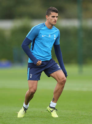 Erik Lamela Lush Green Football Field Wallpaper