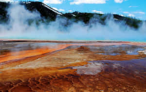 Erupting Geyser At Yellowstone National Park Wallpaper