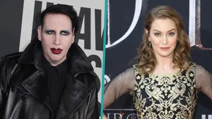 Esmé Bianco Striking A Pose In A Chic Outfit Wallpaper