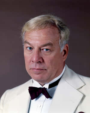 Esteemed Actor, George Kennedy In A Classic Pose Wallpaper