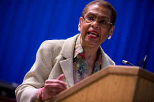 Esteemed Congresswoman Eleanor Holmes Norton Striking A Powerful Pose Wallpaper