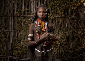 Ethiopia Girl Holding Goat Wallpaper