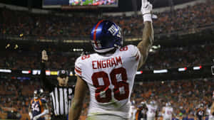 Evan Engram Celebratingon Field Wallpaper