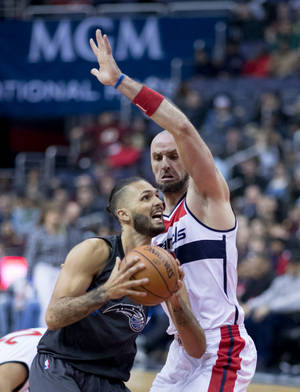 Evan Fournier Against Marcin Gortat Magic Vs. Wizards Wallpaper