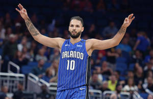 Evan Fournier Three Point Shot Magic Vs. Sacramento Kings Wallpaper