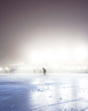 Evening Ice Rink Under Starry Sky Wallpaper