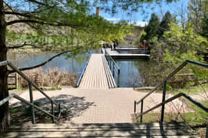 Evergreen Brick Works Pond Walkway Wallpaper