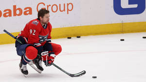 Evgeny Kuznetsov In Action On The Ice Wallpaper