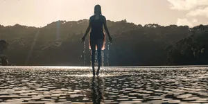 Evil Dead Rise Sinister Figure Water Wallpaper