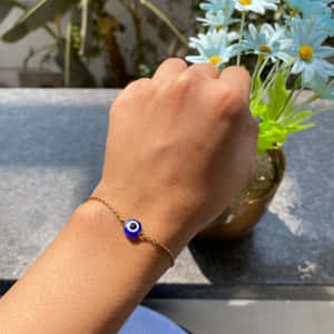 Evil Eye Bracelet Floral Backdrop Wallpaper