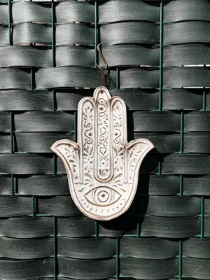 Evil Eye Hand Sculpture Wallpaper