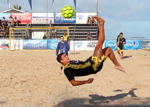 Exceptional Kick In A Beach Soccer Game Wallpaper