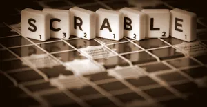 Excited Children Playing An Educational Game On A Colorful Interactive Board Wallpaper