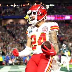 Excited Football Player Celebration Wallpaper