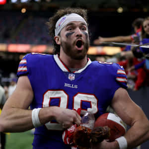 Excited Football Player Celebration Wallpaper