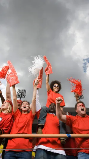 Excited Sports Fans Cheering Wallpaper