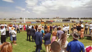 Exciting Atmosphere At Melbourne Cup Day Wallpaper