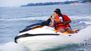 Exciting Beach Water Sports Adventure Wallpaper