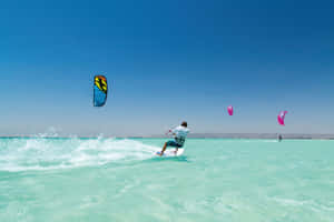 Exciting Beach Water Sports Adventure Wallpaper