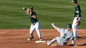 Exciting College Baseball Game In Action Wallpaper