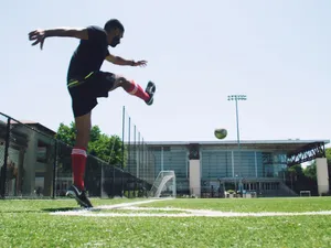 Exciting Corner Kick In Progress Wallpaper