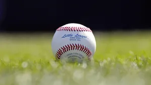 Exciting Little League Baseball Game In Action Wallpaper