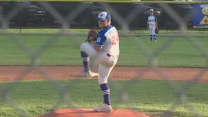 Exciting Little League Baseball Game Moment Wallpaper