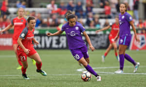 Exciting Match Of The Portland Thorns Fc Under Floodlights Wallpaper