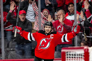 Exciting Moments With Nj Devils Player Wallpaper