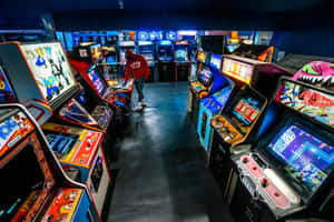 Exciting Vintage Arcade Gaming Experience Wallpaper