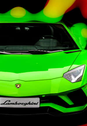 Experience An Adrenaline Rush In A Green Lamborghini Wallpaper