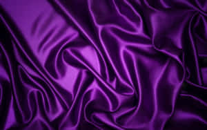 Experience Luxury With Our Purple Fabrics Wallpaper