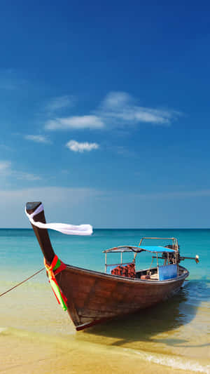 Experience Serenity At The Stunning Thailand Beach Wallpaper